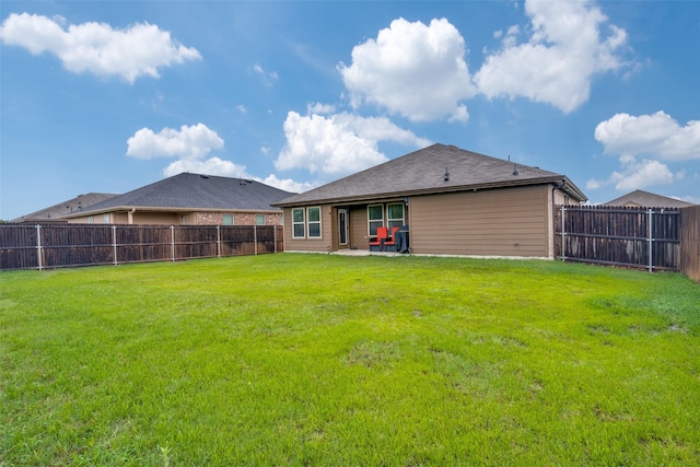706 Meadow Creek Ln, Josephine, TX 75189 - rear view of property with a fenced backyard, a patio, and roof with shingles