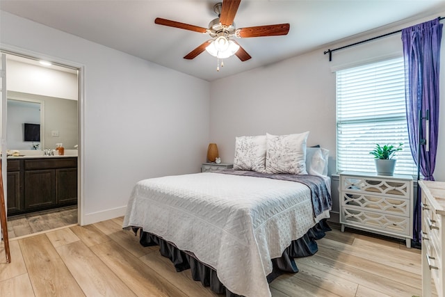 604 Grand Falls Ln, Mckinney, TX 75071 - bedroom featuring light wood-type flooring, ensuite bath, and a ceiling fan