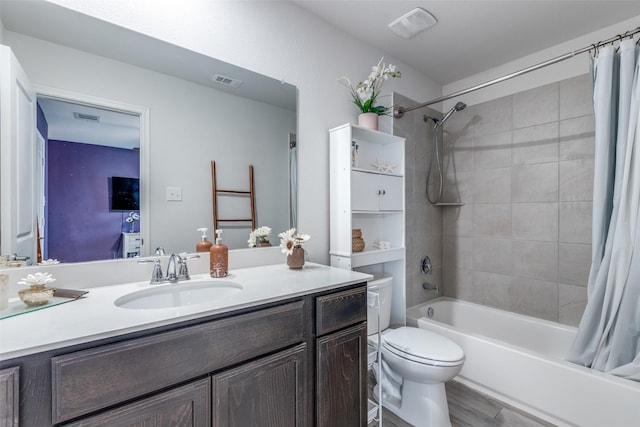 604 Grand Falls Ln, Mckinney, TX 75071 - full bathroom featuring shower / bath combo with shower curtain, vanity, and wood finished floors
