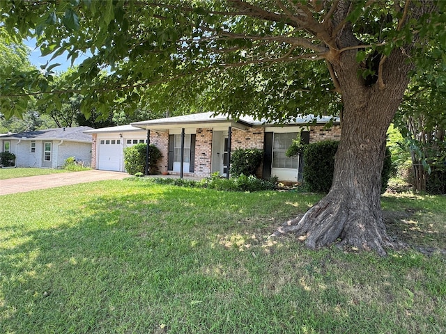 1815 Redwood St, Arlington, TX 76014 - view of front of house featuring brick siding, a garage, a front lawn, and concrete driveway