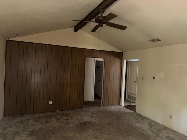 1815 Redwood St, Arlington, TX 76014 - carpeted spare room with a ceiling fan and wood walls