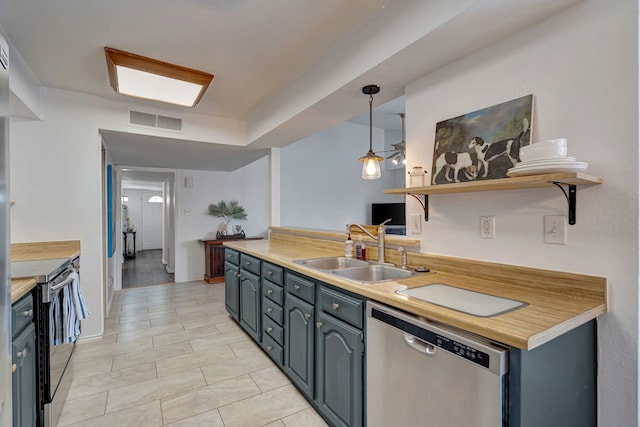 3909 Commonwealth Dr, Flower Mound, TX 75028 - kitchen with stainless steel dishwasher, range with electric stovetop, open shelves, and light countertops