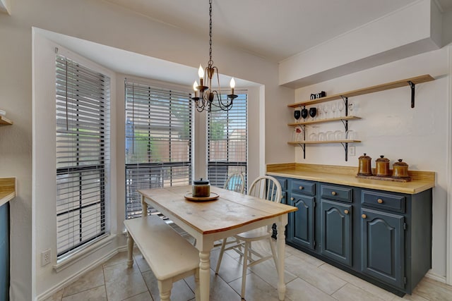 3909 Commonwealth Dr, Flower Mound, TX 75028 - dining area with light tile patterned floors, a chandelier, and a bar