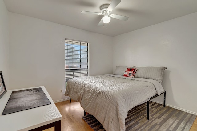 3909 Commonwealth Dr, Flower Mound, TX 75028 - bedroom with light wood-style flooring and a ceiling fan