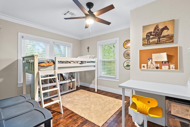 1056 Park Dr, Hillsboro, TX 76645 - bedroom with crown molding, dark wood-style floors, multiple windows, and a ceiling fan