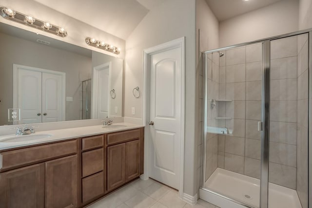 1610 Dove Dr, Princeton, TX 75407 - full bath featuring tile patterned flooring, double vanity, and a stall shower
