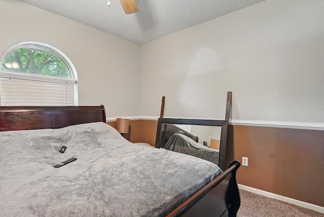 3102 Primrose Dr, Abilene, TX 79606 - carpeted bedroom featuring a textured ceiling and a ceiling fan