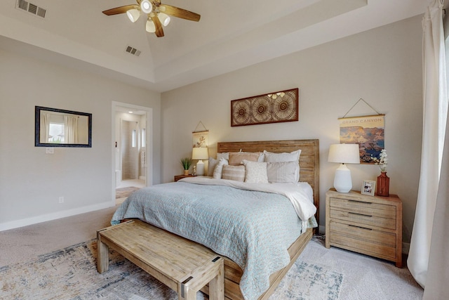 2801 Capitol Pl, Melissa, TX 75454 - bedroom with light colored carpet, a raised ceiling, ensuite bath, and ceiling fan