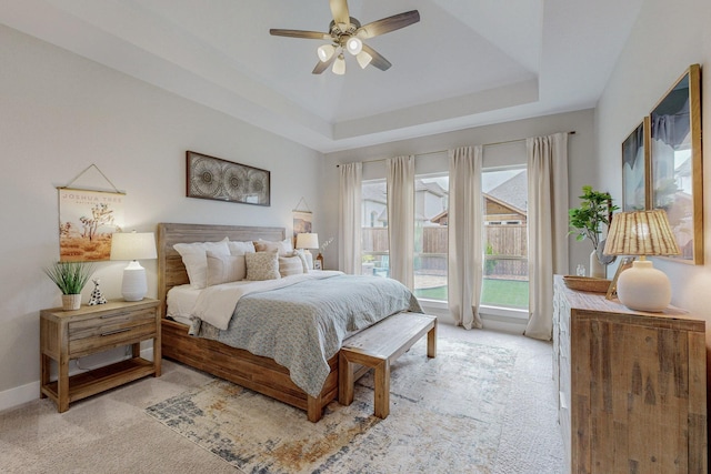 2801 Capitol Pl, Melissa, TX 75454 - bedroom with light carpet, a raised ceiling, and ceiling fan