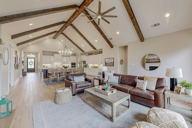 2801 Capitol Pl, Melissa, TX 75454 - living area with a chandelier, beam ceiling, a ceiling fan, light wood-style floors, and high vaulted ceiling