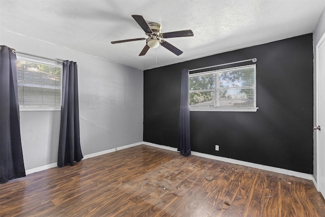 3312 Henry Dr, Richland Hills, TX 76118 - unfurnished room featuring healthy amount of natural light, wood finished floors, a ceiling fan, and a textured ceiling