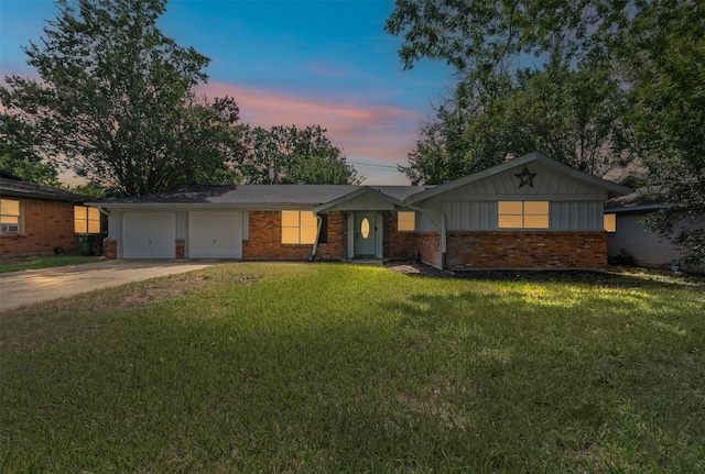 3312 Henry Dr, Richland Hills, TX 76118 - view of front of house featuring driveway, brick siding, a garage, and a front yard