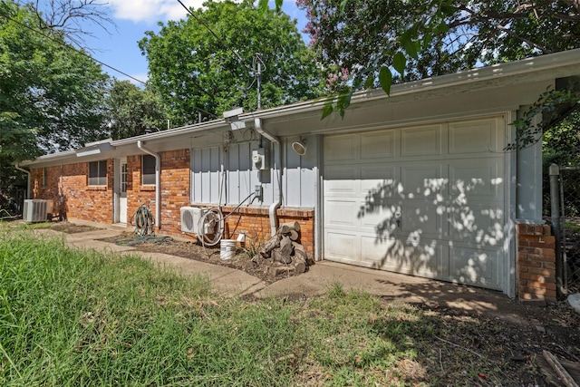 3312 Henry Dr, Richland Hills, TX 76118 - view of front of home with brick siding, board and batten siding, and a garage