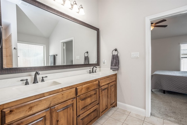 103 Loving Trl, Justin, TX 76247 - full bath featuring tile patterned floors, double vanity, a ceiling fan, ensuite bath, and vaulted ceiling