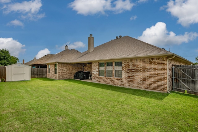103 Loving Trl, Justin, TX 76247 - back of property featuring a fenced backyard, a storage unit, a chimney, brick siding, and roof with shingles