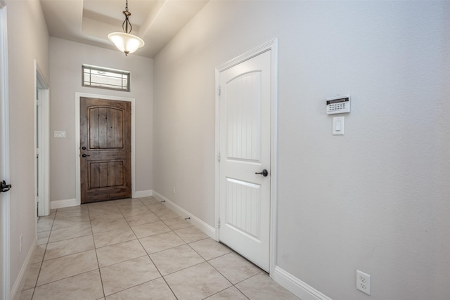 103 Loving Trl, Justin, TX 76247 - entrance foyer featuring light tile patterned flooring and a raised ceiling