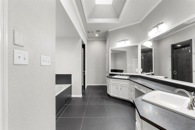 9604 Oak Springs Dr, Woodway, TX 76712 - full bath with double vanity, tile patterned flooring, a garden tub, ornamental molding, and a textured wall
