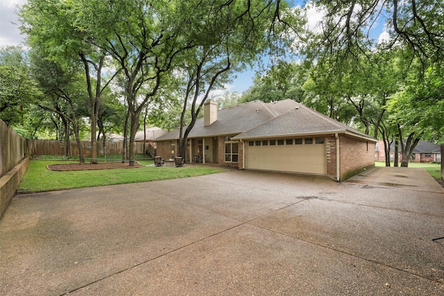 9604 Oak Springs Dr, Woodway, TX 76712 - view of front of home featuring a garage, brick siding, a chimney, concrete driveway, and roof with shingles