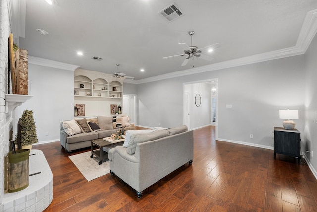 9604 Oak Springs Dr, Woodway, TX 76712 - living room featuring a ceiling fan, crown molding, dark wood finished floors, recessed lighting, and a fireplace