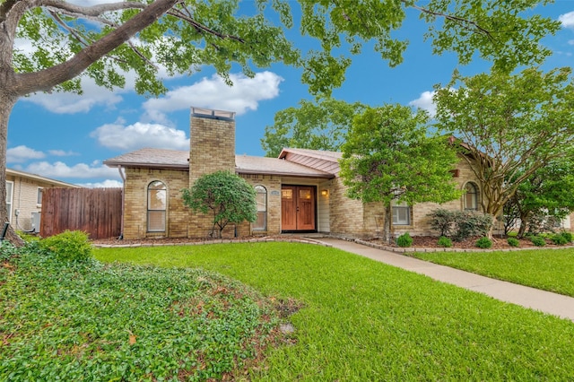 308 Woodhurst Pl, Coppell, TX 75019 - view of front of house featuring a chimney