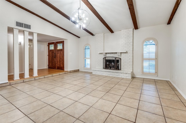 308 Woodhurst Pl, Coppell, TX 75019 - unfurnished living room featuring light tile patterned floors and a fireplace