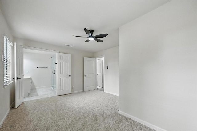 8620 Greenmound Ave, Dallas, TX 75227 - unfurnished bedroom featuring carpet floors, connected bathroom, and ceiling fan