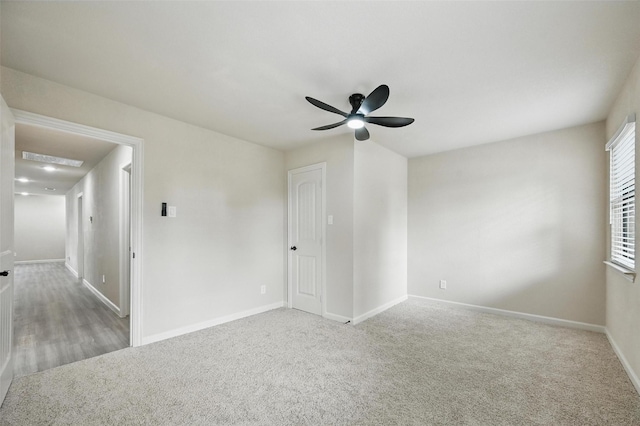 8620 Greenmound Ave, Dallas, TX 75227 - carpeted empty room featuring a ceiling fan and baseboards