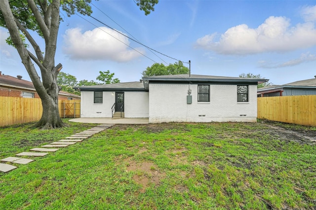 8620 Greenmound Ave, Dallas, TX 75227 - back of house with brick siding, crawl space, a patio area, and a fenced backyard