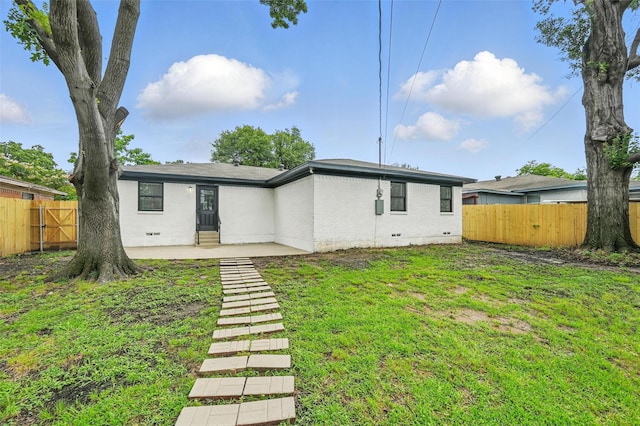 8620 Greenmound Ave, Dallas, TX 75227 - back of property with crawl space, brick siding, a fenced backyard, and a patio area