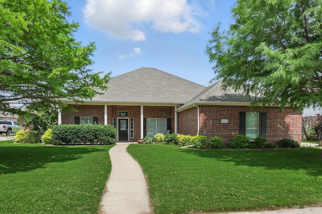 13272 Blue Jean Dr, Fort Worth, TX 76052 - view of front facade featuring a front yard, brick siding, and a shingled roof