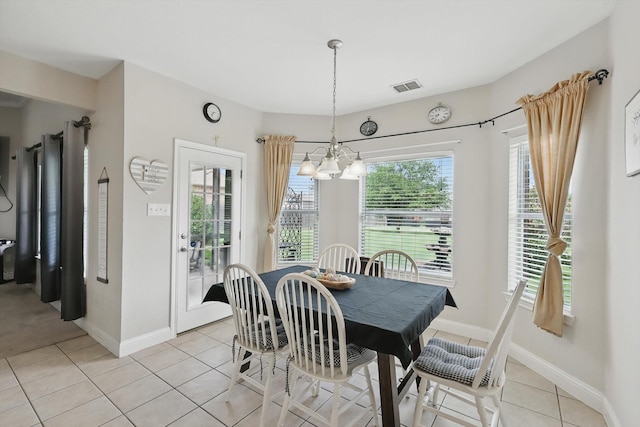 13272 Blue Jean Dr, Fort Worth, TX 76052 - dining area with a chandelier and light tile patterned flooring