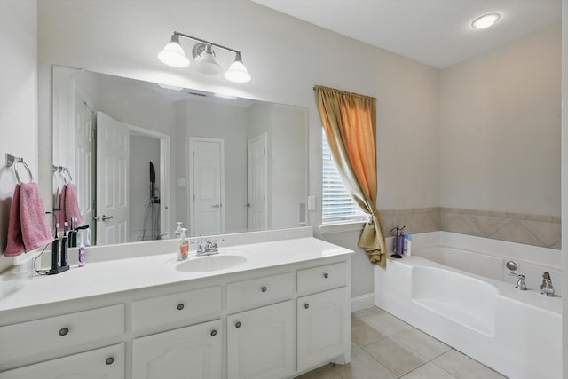 13272 Blue Jean Dr, Fort Worth, TX 76052 - bathroom featuring tile patterned flooring, vanity, and a bath