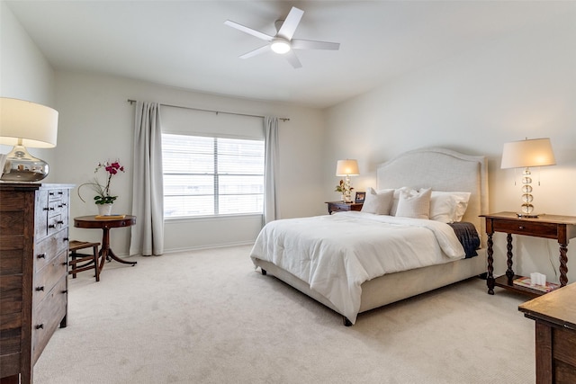 6328 Bandera Ave Unit C, Dallas, TX 75225 - bedroom with light carpet and ceiling fan