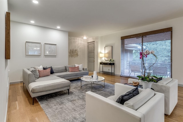 6328 Bandera Ave Unit C, Dallas, TX 75225 - living room with wood finished floors and recessed lighting