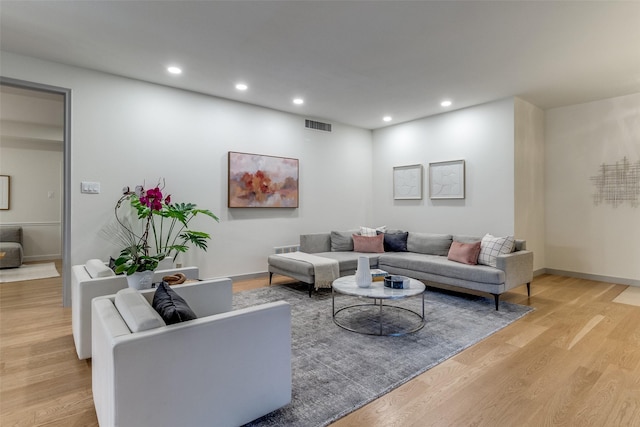 6328 Bandera Ave Unit C, Dallas, TX 75225 - living room with light wood-style flooring and recessed lighting
