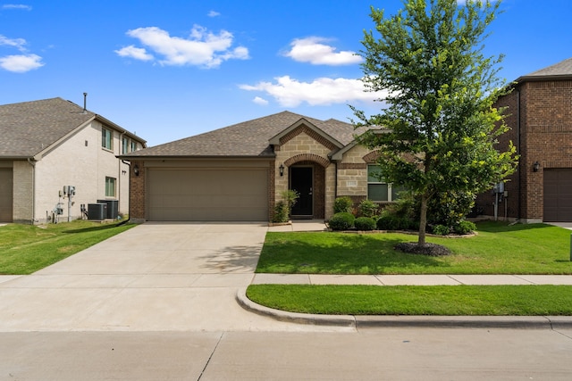 1108 Sheldon Dr, Anna, TX 75409 - french country inspired facade featuring driveway, an attached garage, a front yard, stone siding, and brick siding