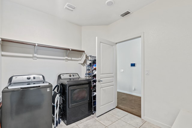 1108 Sheldon Dr, Anna, TX 75409 - washroom featuring independent washer and dryer and light tile patterned floors