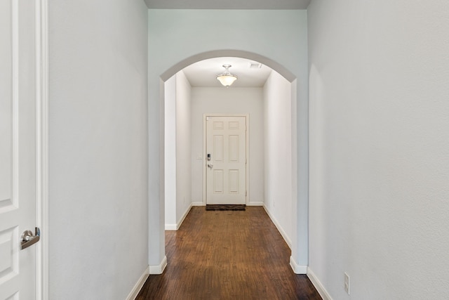 1108 Sheldon Dr, Anna, TX 75409 - hallway featuring arched walkways and dark wood-style floors