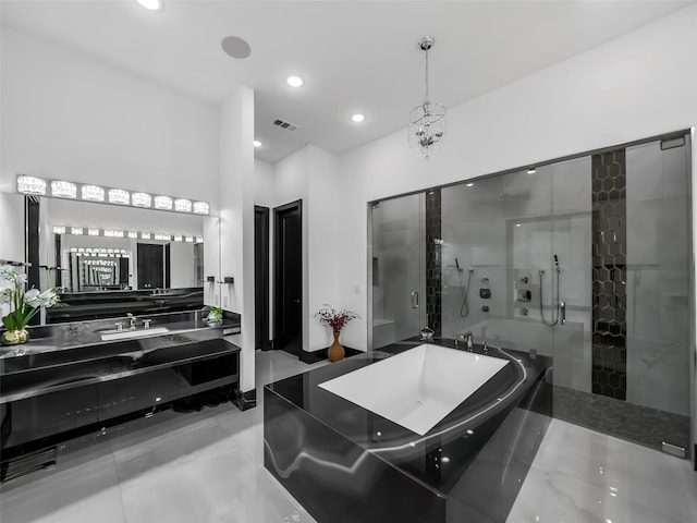 7604 Nocona Dr, Parker, TX 75098 - full bathroom with a freestanding bath, vanity, a stall shower, and recessed lighting