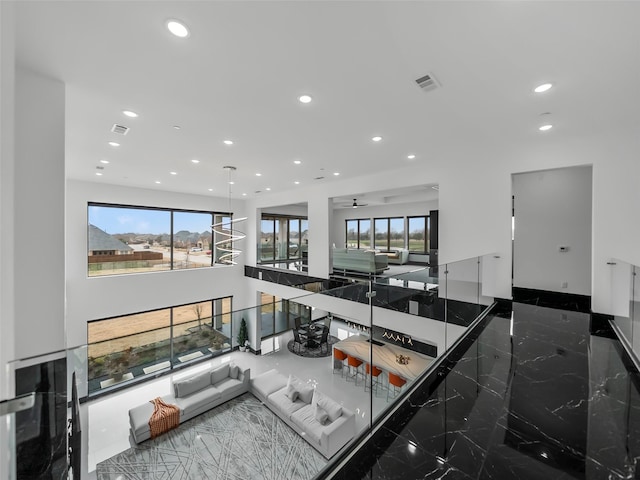 7604 Nocona Dr, Parker, TX 75098 - living area featuring recessed lighting, marble tiled flooring, and a ceiling fan