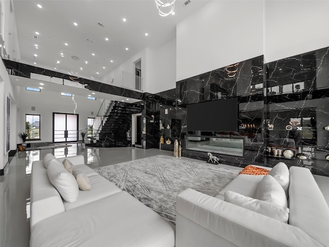7604 Nocona Dr, Parker, TX 75098 - living area featuring a high ceiling and recessed lighting