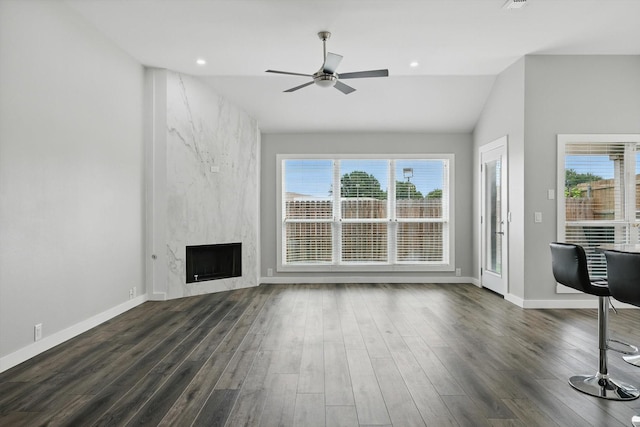 2528 Forestwood Dr, Flower Mound, TX 75028 - unfurnished living room with plenty of natural light, dark wood-type flooring, ceiling fan, vaulted ceiling, and recessed lighting