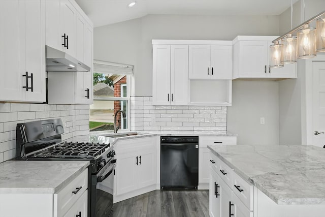 2528 Forestwood Dr, Flower Mound, TX 75028 - kitchen featuring black appliances, wood finished floors, under cabinet range hood, white cabinetry, and lofted ceiling