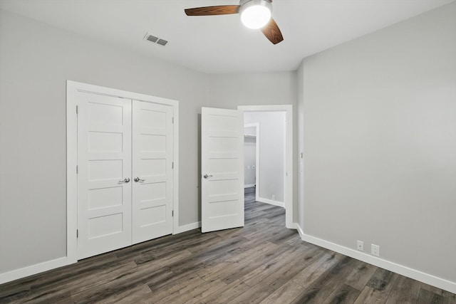 2528 Forestwood Dr, Flower Mound, TX 75028 - unfurnished bedroom with dark wood-style floors, a closet, and ceiling fan