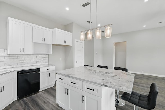 2528 Forestwood Dr, Flower Mound, TX 75028 - kitchen featuring dishwasher, dark wood-type flooring, recessed lighting, a center island, and light stone counters