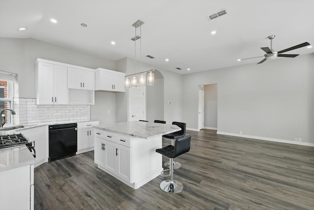2528 Forestwood Dr, Flower Mound, TX 75028 - kitchen featuring dishwasher, a ceiling fan, dark wood-type flooring, a kitchen bar, and recessed lighting