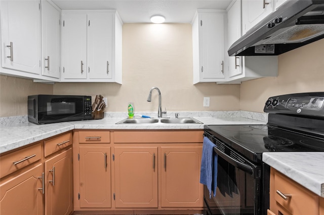 814 S Western Hills Dr, Howe, TX 75459 - kitchen featuring black appliances, under cabinet range hood, light countertops, and white cabinetry