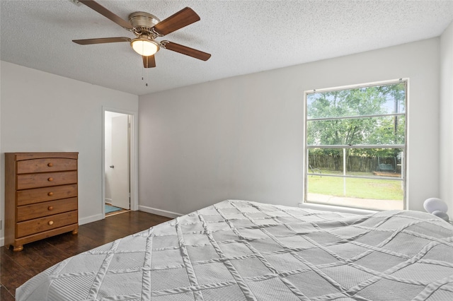 814 S Western Hills Dr, Howe, TX 75459 - bedroom with wood finished floors, a textured ceiling, and ceiling fan