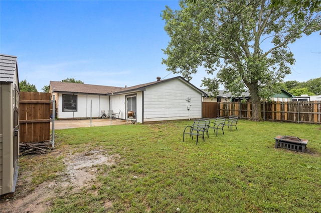 814 S Western Hills Dr, Howe, TX 75459 - rear view of property with a fenced backyard, a fire pit, and a patio