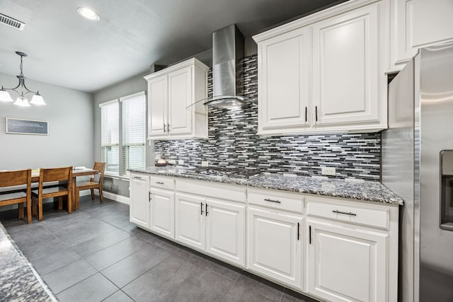 1017 Appalachian Ln, Savannah, TX 76227 - kitchen featuring stainless steel appliances, wall chimney range hood, decorative backsplash, hanging light fixtures, and recessed lighting